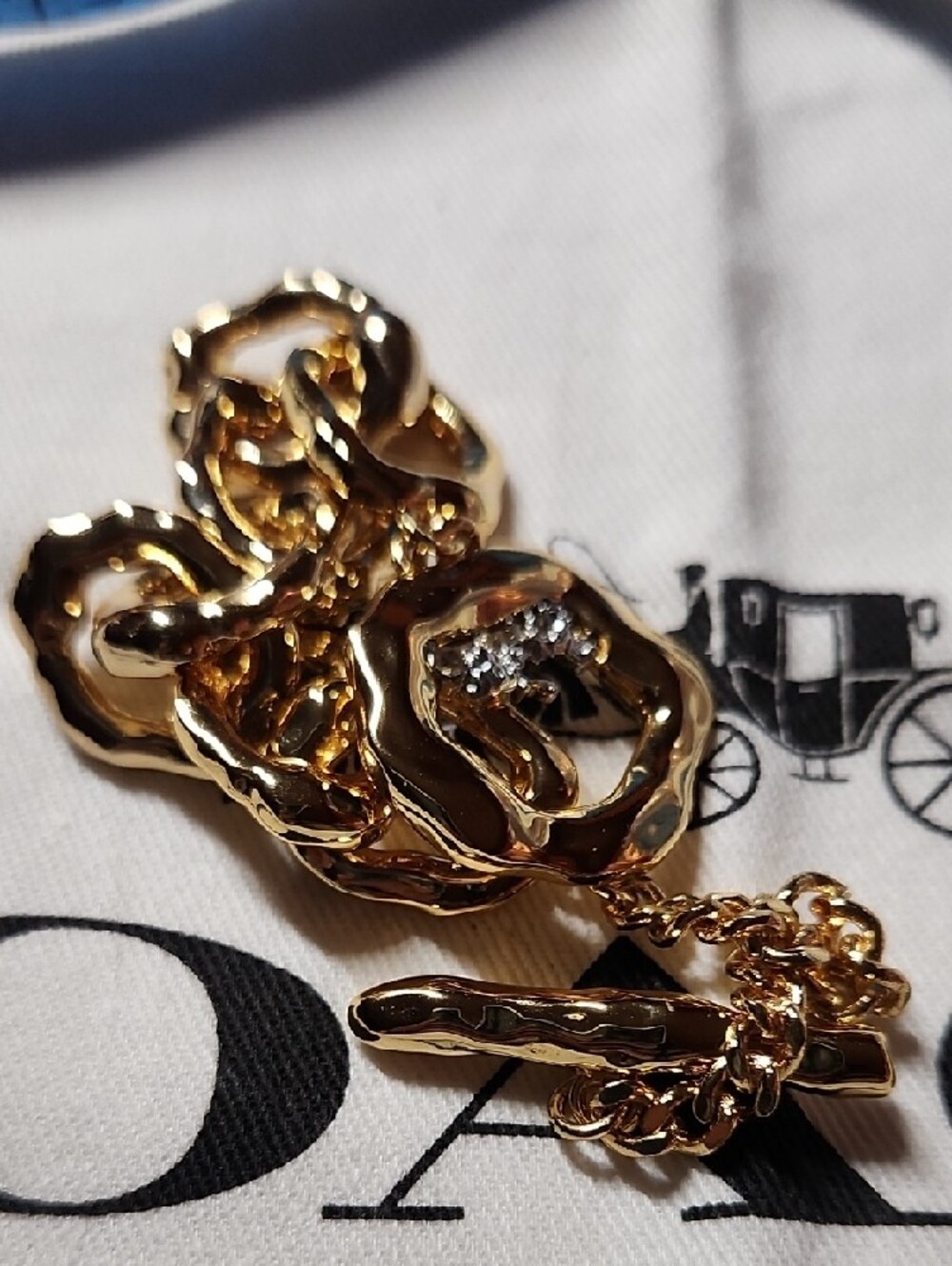 Coach Gold-Tone Chunky Link Bracelet with Dangle Charm - Picture 11 of 11